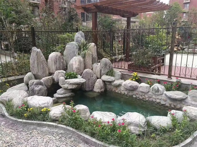 广州庭院假山鱼池制作视频